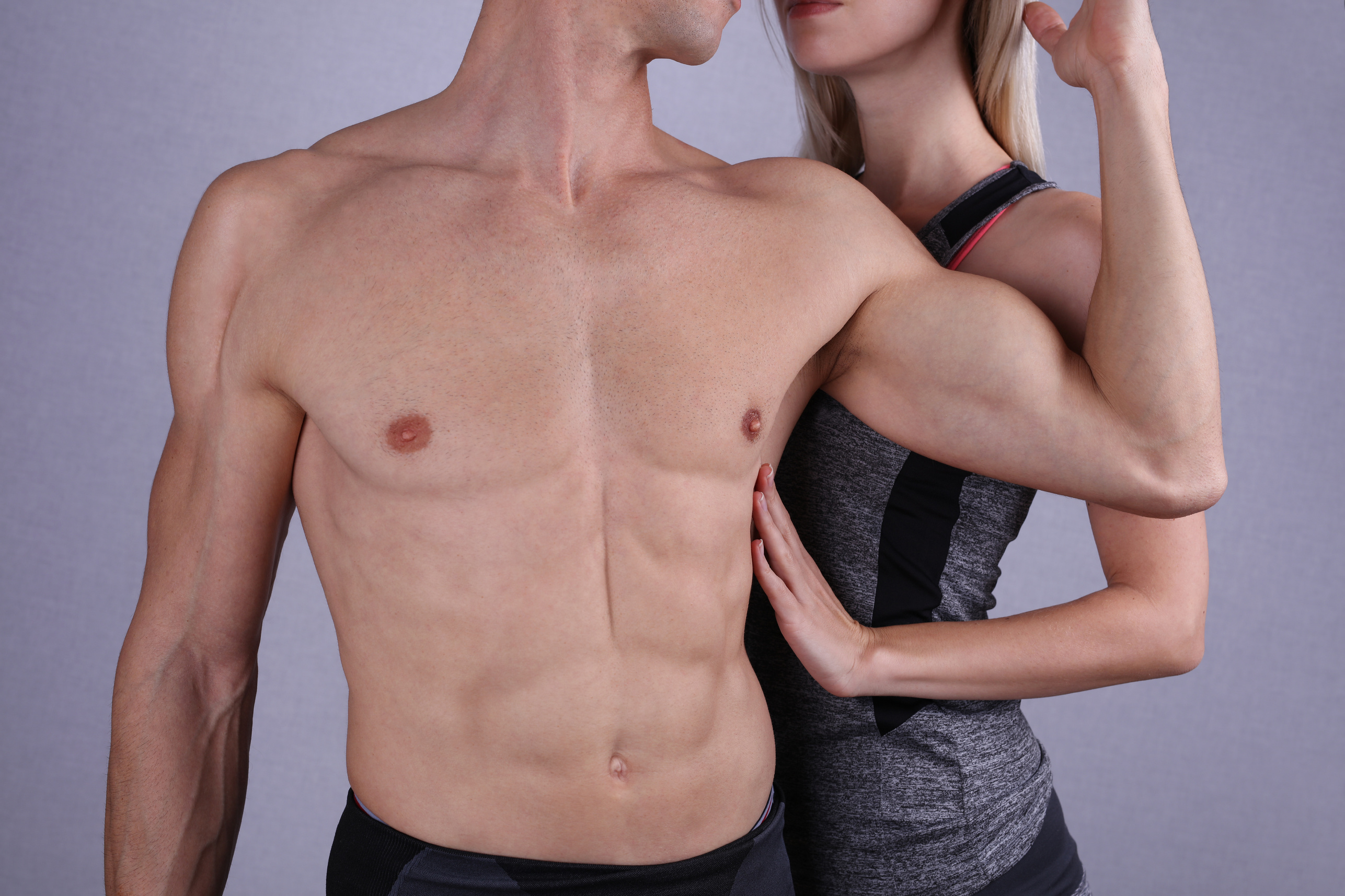 Fit, fitness couple. Laser hair removal for men and woman.